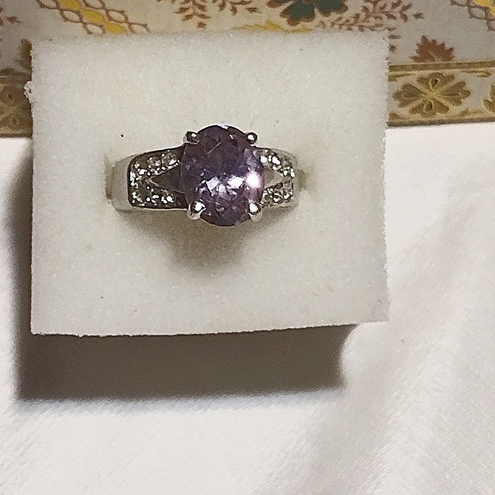 Beautiful Amethyst and white topaz ring. Absolutely gorgeous piece.